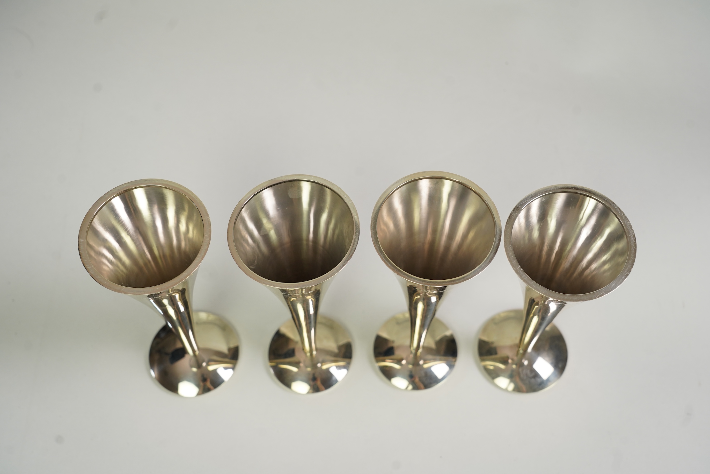 Two pairs of Elizabeth II Stuart Devlin silver candlestick bases